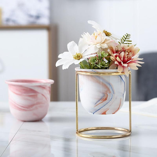 https://stillserenity.com/cdn/shop/products/1-PC-Nordic-Style-Marble-Pattern-Ceramics-Golden-Iron-Art-Vase-Tabletop-Flower-Pot-Home-Wedding_224263f2-e847-47cd-a078-e1900452a185_600x.jpg?v=1591376781