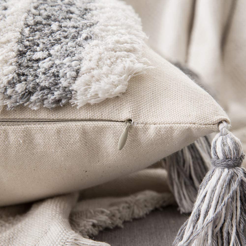 Grey tassel pillow top