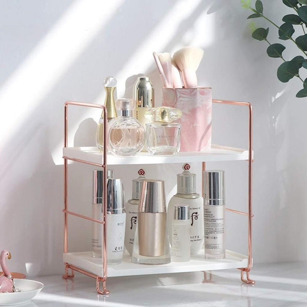 Gold bathroom outlet storage rack