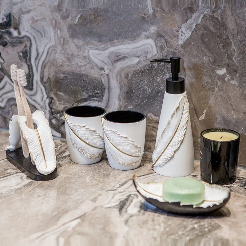 https://stillserenity.com/cdn/shop/products/Resin-Feather-Bathroom-Supplies-Toothbrush-Holder-Lotion-Bottle-Mouth-Cup-Soap-Dish-Bathroom-Kit-Home-Decoration_7dccbcaf-4818-4e03-96e2-41b153976492_800x.jpg?v=1645267018